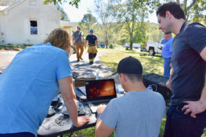 Reviewing the footage after the fire.